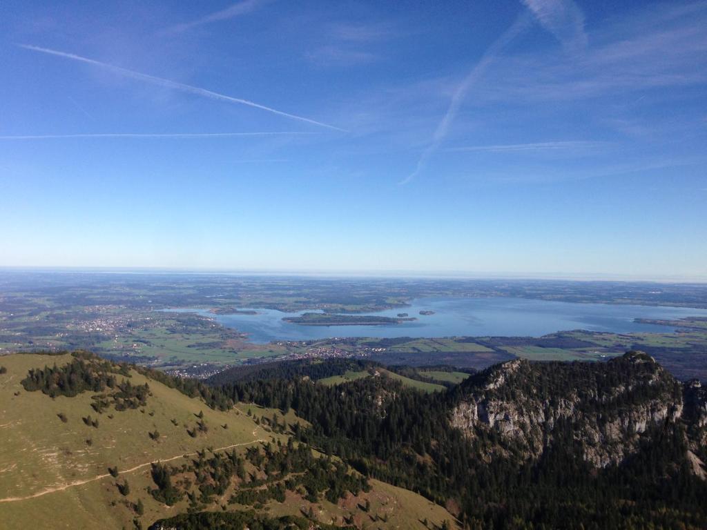 a view of a lake from the top of a mountain at Chiemgautraum in Siegsdorf