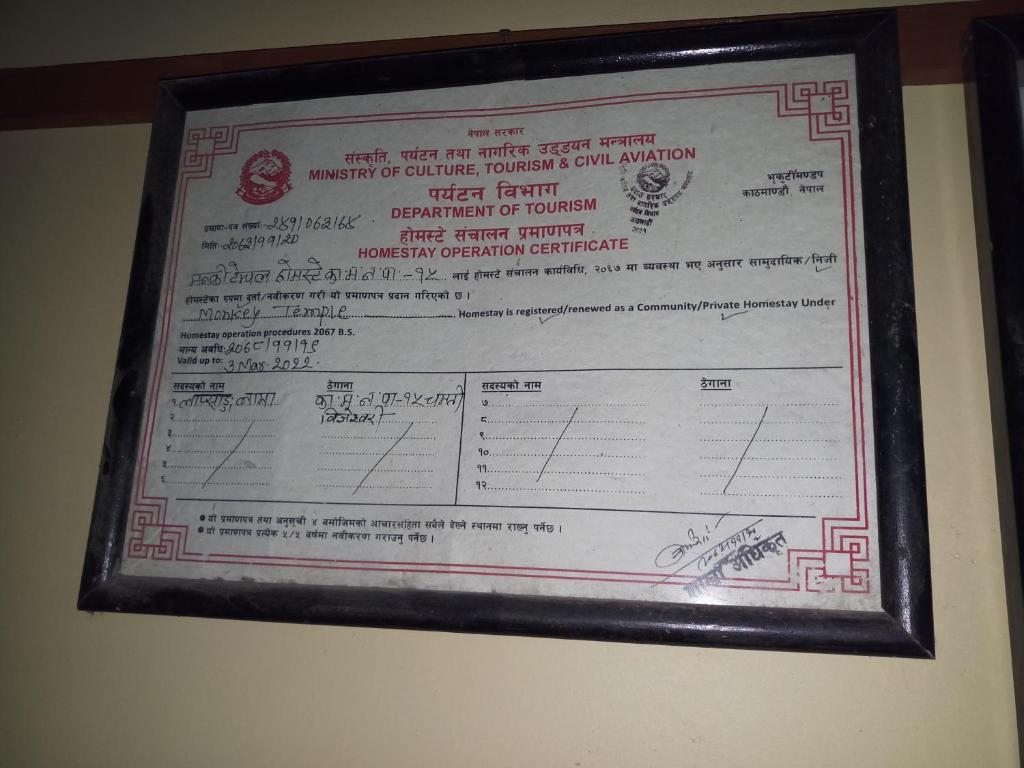 Certifikát, hodnocení, plakát nebo jiný dokument vystavený v ubytování Monkey Temple Homestay