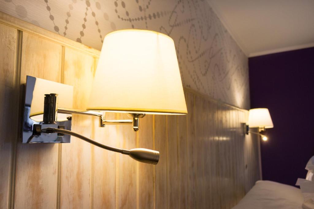 Postel nebo postele na pokoji v ubytování LV Hoteles Boutique