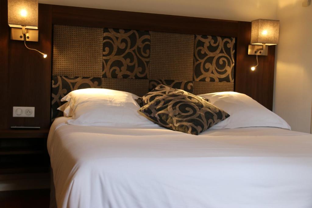 Postel nebo postele na pokoji v ubytování Hotel B Lodge