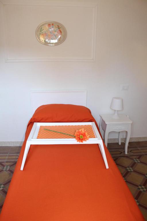 Postel nebo postele na pokoji v ubytování B&B Bouquet di fiori