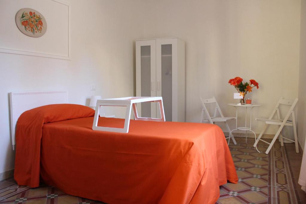 Postel nebo postele na pokoji v ubytování B&B Bouquet di fiori
