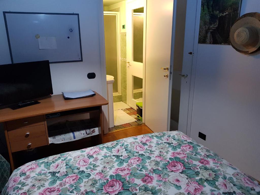 A bed or beds in a room at B&B Cavaliere Milano