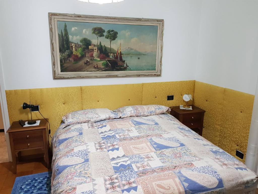 A bed or beds in a room at B&B Cavaliere Milano