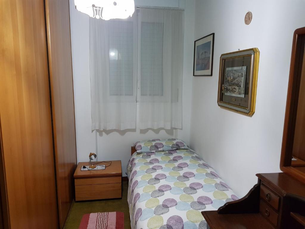 A bed or beds in a room at B&B Cavaliere Milano