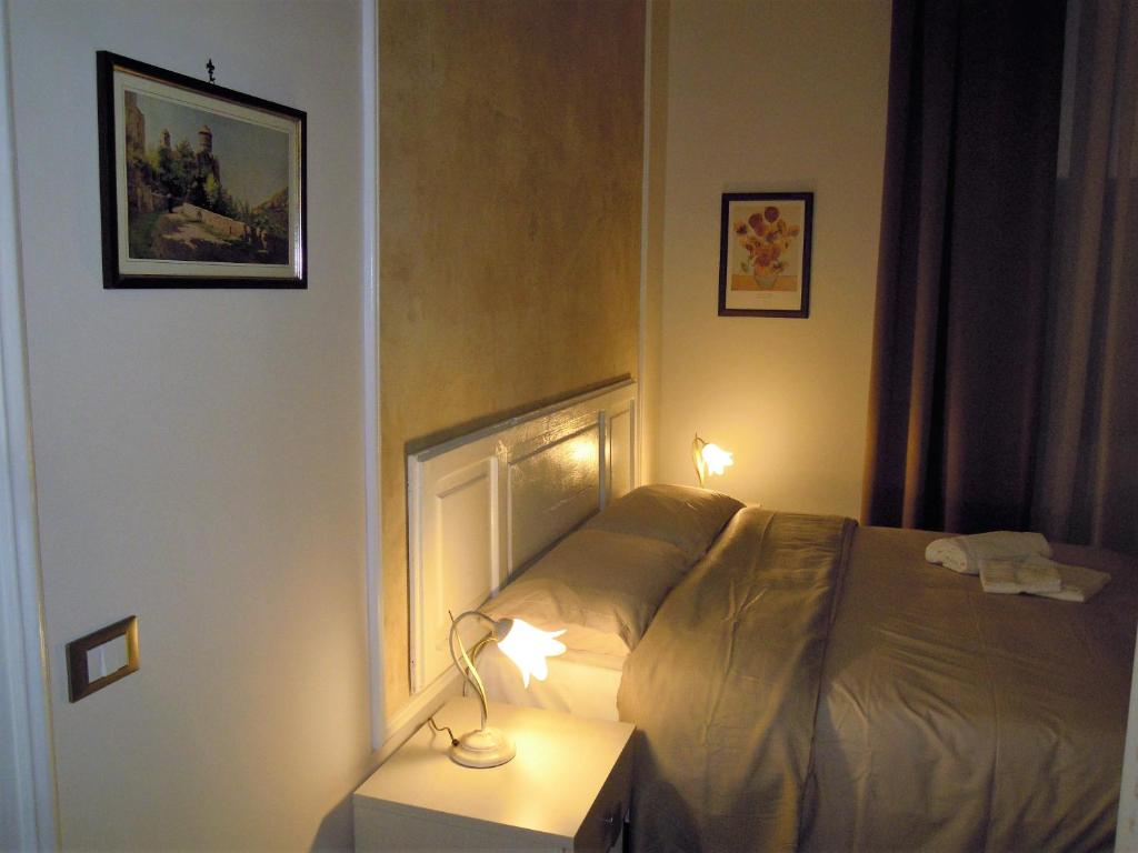 Postel nebo postele na pokoji v ubytování Primo Posto