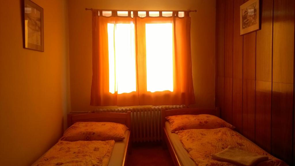 Postel nebo postele na pokoji v ubytování Penzion Lipůvka