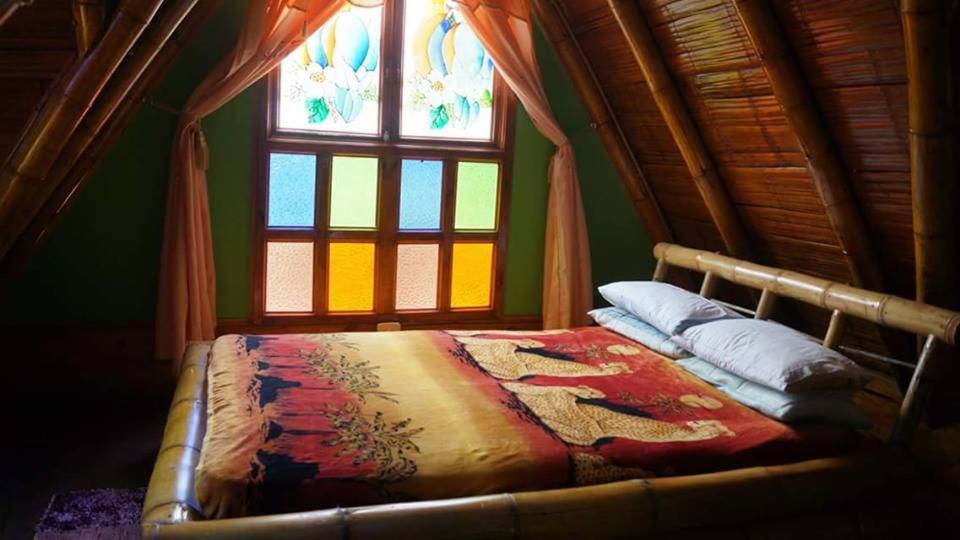 Postel nebo postele na pokoji v ubytování Hospedaje Rural Tupinamba
