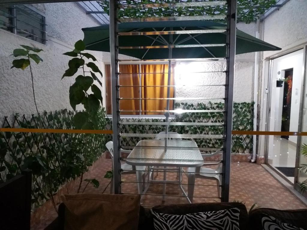 Patio nebo venkovní prostory v ubytování hotel medellin calasanz