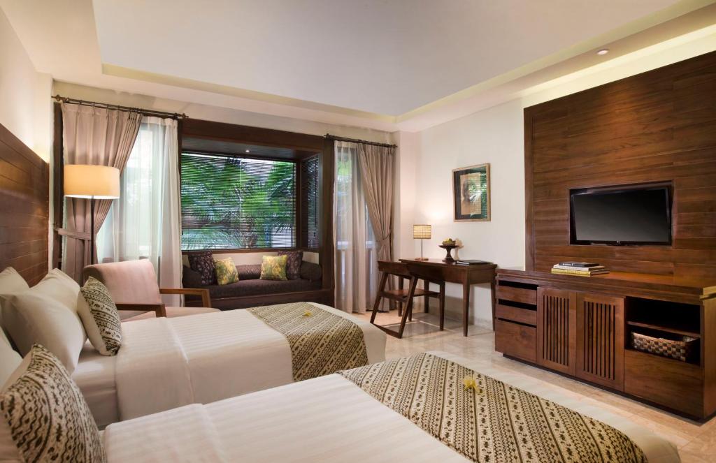 TV a/nebo společenská místnost v ubytování Ubud Village Hotel