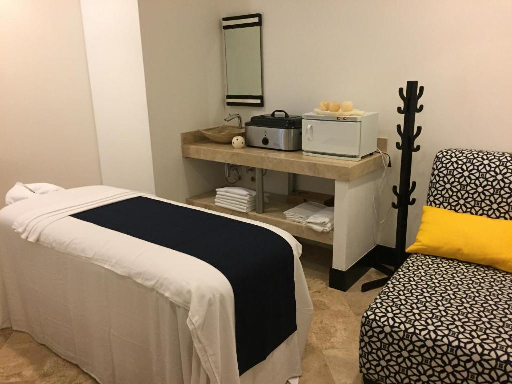 Ένα ή περισσότερα κρεβάτια σε δωμάτιο στο Bay View Grand Marina 203 - Sur