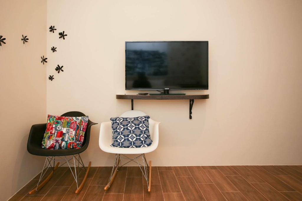 TV a/nebo společenská místnost v ubytování Fa Dai Homestay