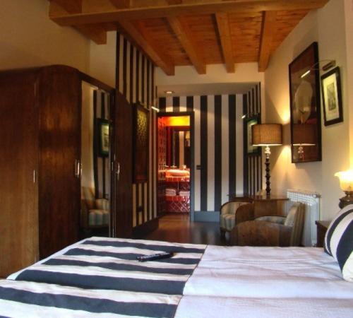 Postel nebo postele na pokoji v ubytování Hotel-Hospedería los Templarios