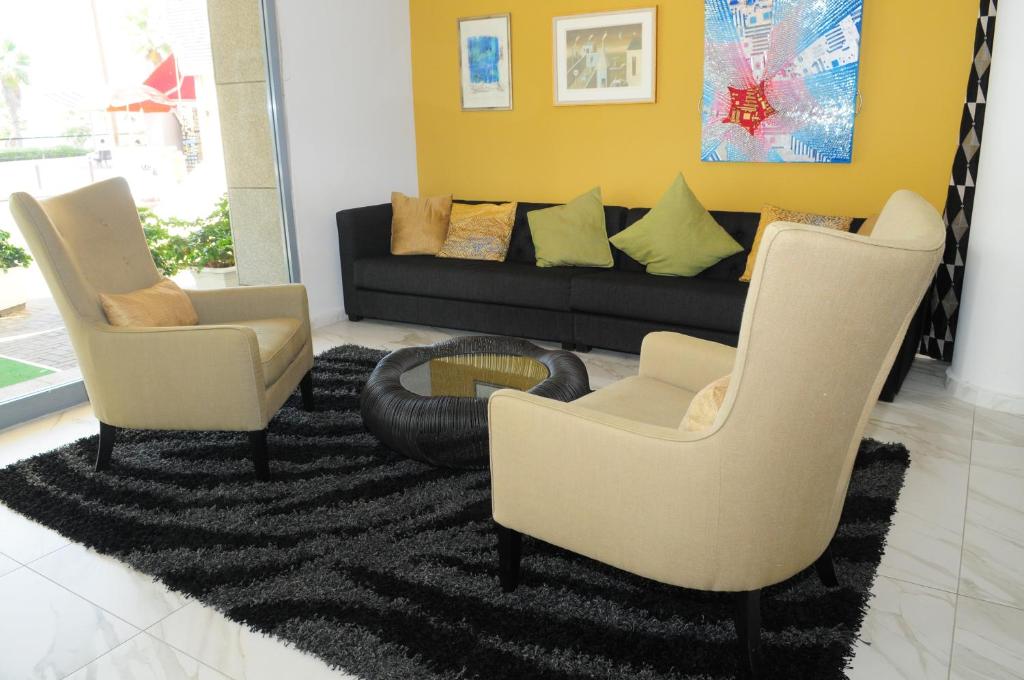 Posezení v ubytování Maxim Design Hotel 3 Star Superior
