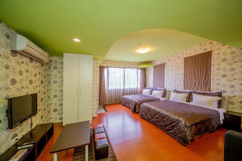 Songfeng Xiuxian Homestay - Chambre Quadruple Avec Salle De Bain