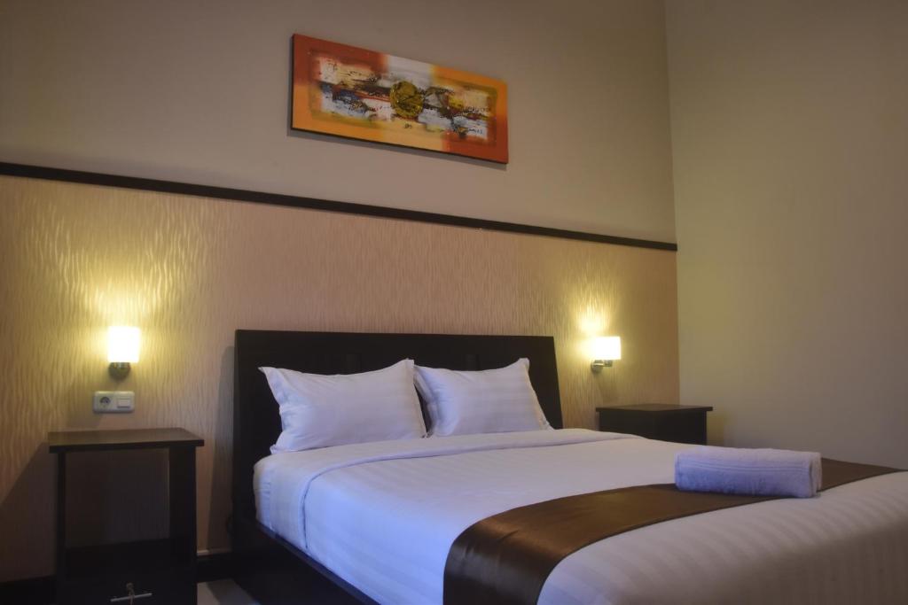 Postel nebo postele na pokoji v ubytování Hotel Orizatha