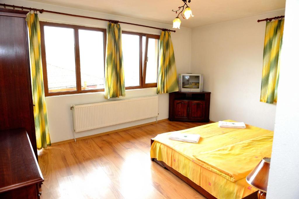 Postel nebo postele na pokoji v ubytování Guest House Mavrudieva
