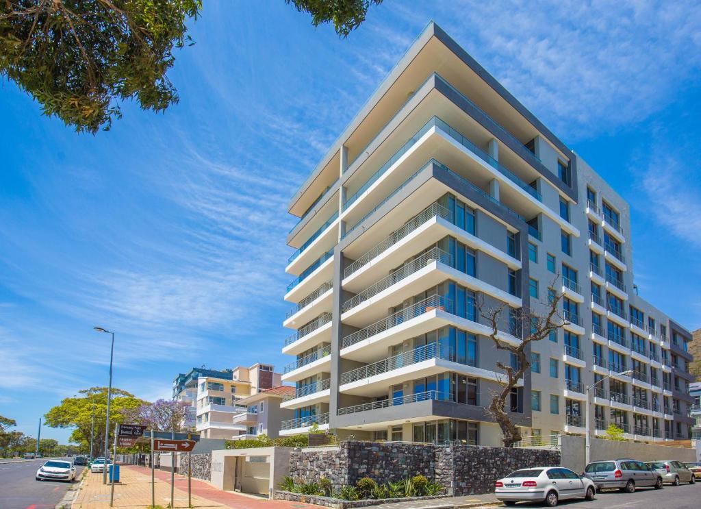 an apartment building on the corner of a street at The Odyssee 409 in Cape Town