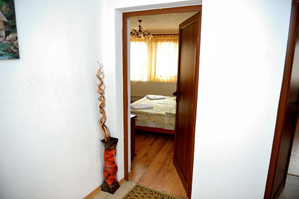 Postel nebo postele na pokoji v ubytování Guest House Mavrudieva