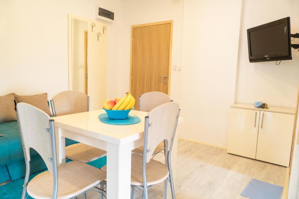 TV a/nebo společenská místnost v ubytování Apartments Maja