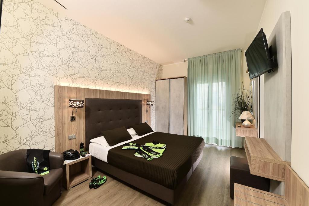 TV a/nebo společenská místnost v ubytování Hotel Doge