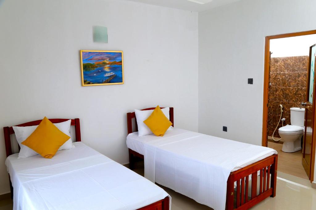 Postel nebo postele na pokoji v ubytování Villa Serene