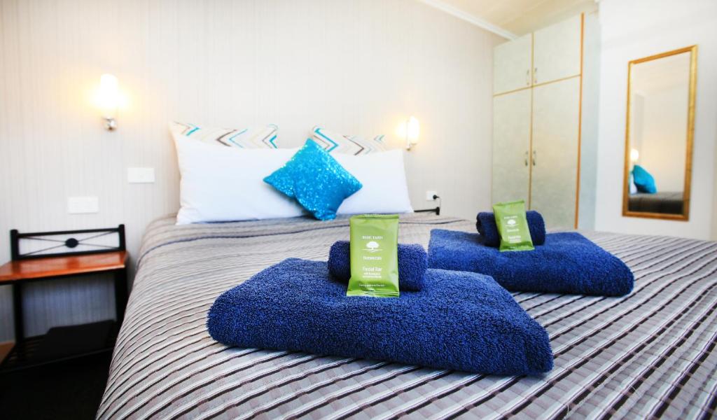 Postel nebo postele na pokoji v ubytování Central Motel Gin Gin