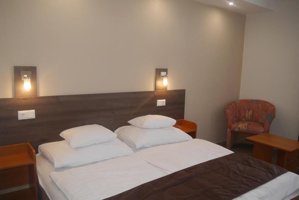 Postel nebo postele na pokoji v ubytování Hotel Tagore