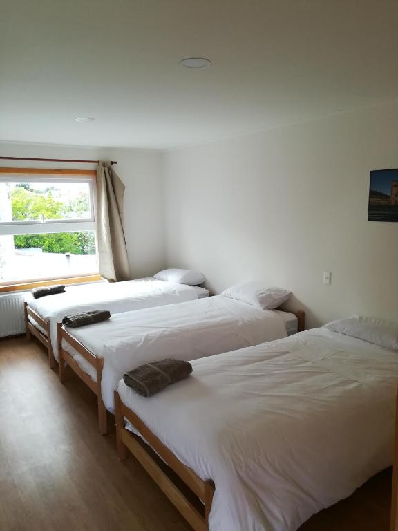 Voodi või voodid majutusasutuse Hostal Camino de Santiago toas