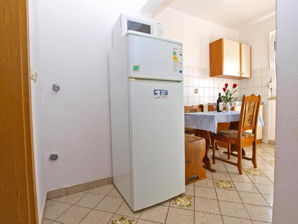 Kuchyňa alebo kuchynka v ubytovaní Apartments Silvana 143