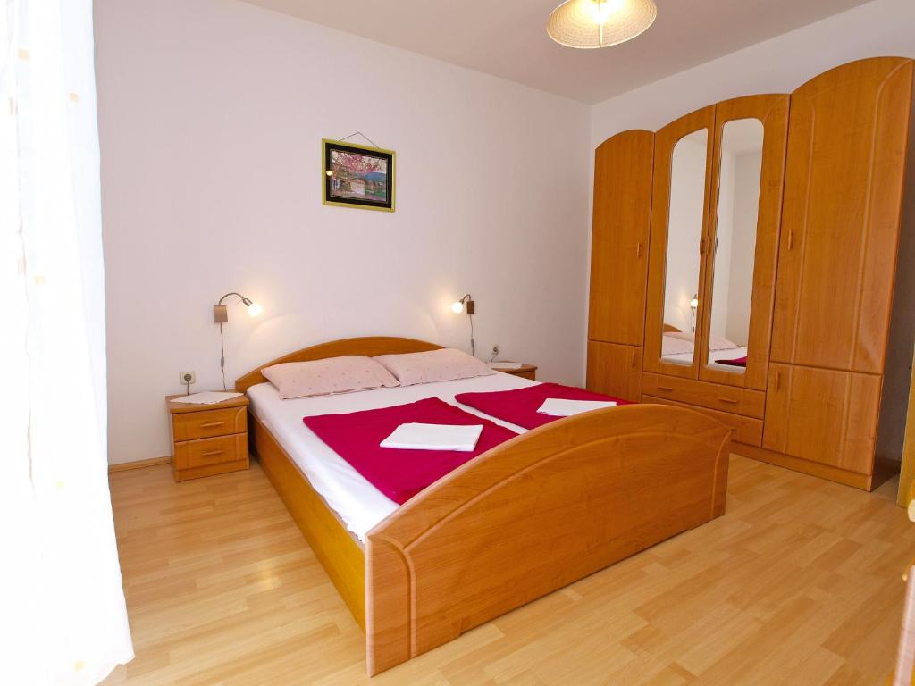 Posteľ alebo postele v izbe v ubytovaní Apartments Silvana 143