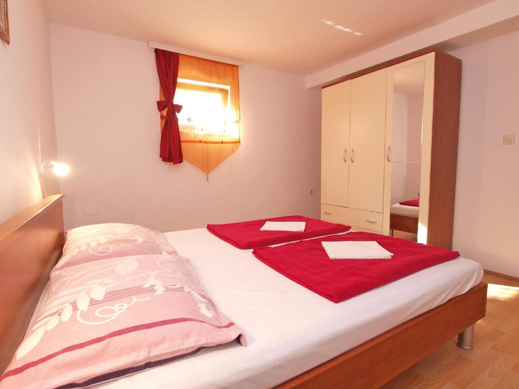 Posteľ alebo postele v izbe v ubytovaní Apartments Silvana 143