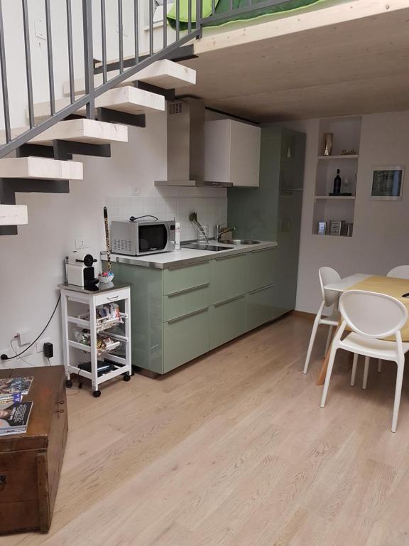 A kitchen or kitchenette at Domus Navigli