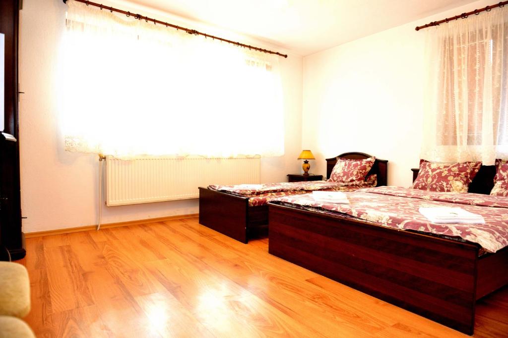 Postel nebo postele na pokoji v ubytování Guest House Mavrudieva