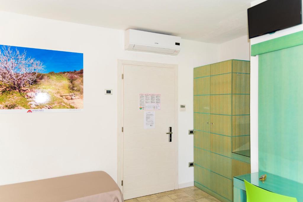TV a/nebo společenská místnost v ubytování Hotel Montecristo