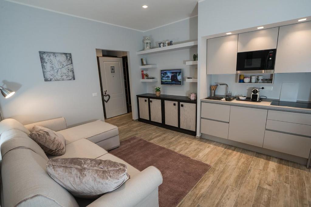 Kuchyňa alebo kuchynka v ubytovaní Laura Family Apartments