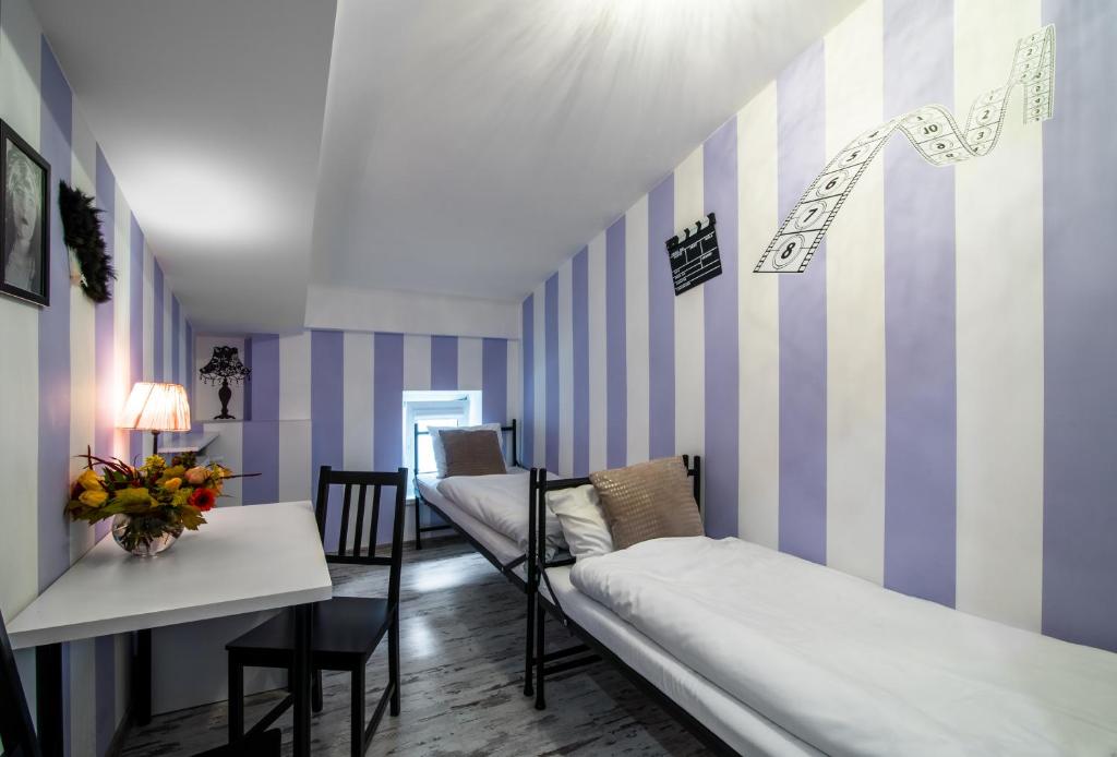 Postel nebo postele na pokoji v ubytování AB Hostel
