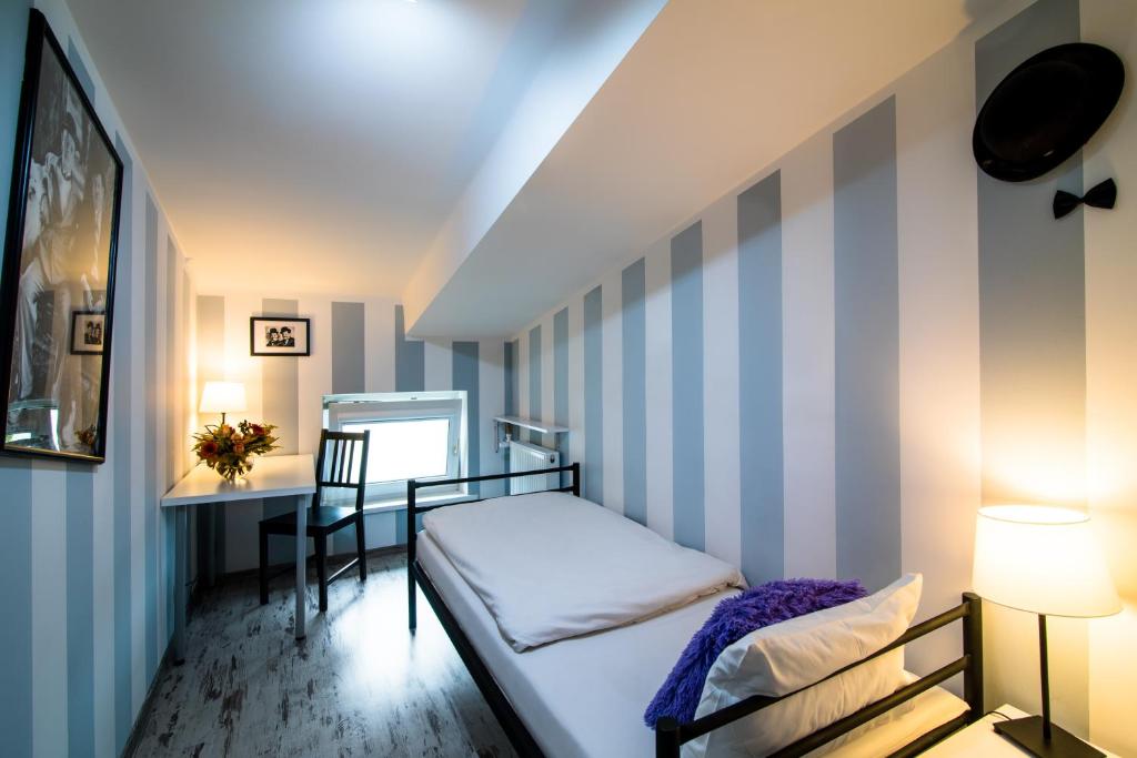Postel nebo postele na pokoji v ubytování AB Hostel