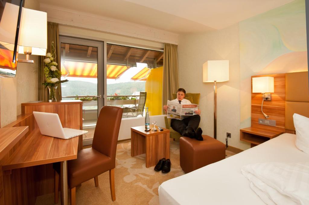 Postel nebo postele na pokoji v ubytování Albtalblick Ihr Wellness- & Wanderhotel