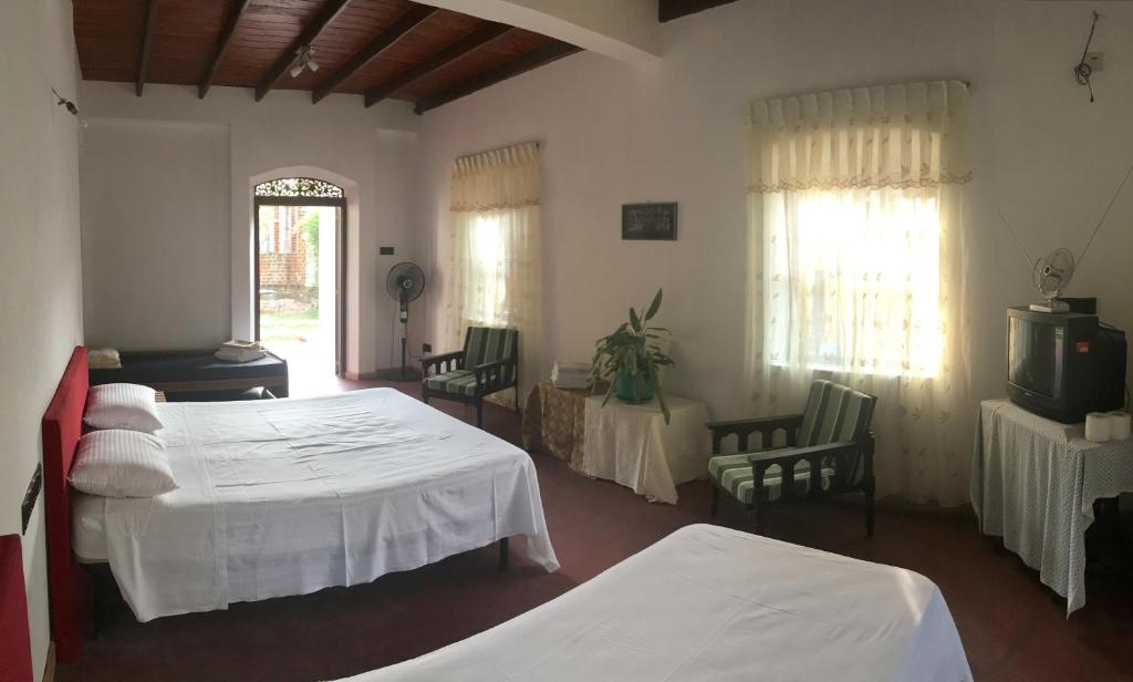 Postel nebo postele na pokoji v ubytování Hotel La Felicita