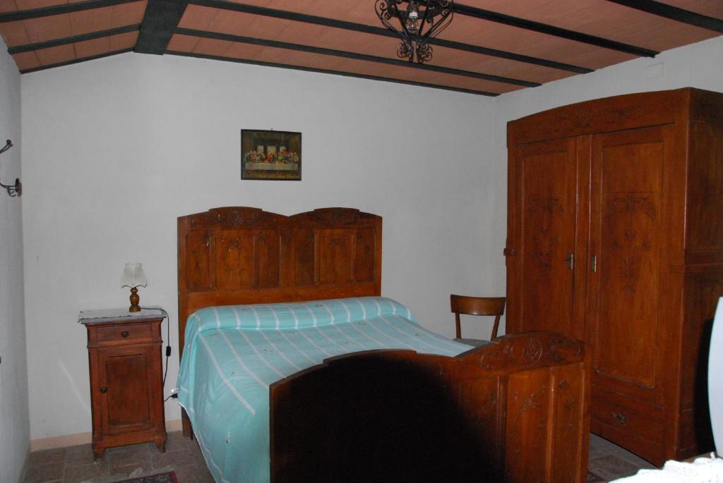 Postel nebo postele na pokoji v ubytování B&B Cascina Bricchetto