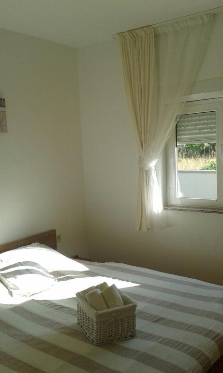 Posteľ alebo postele v izbe v ubytovaní Apartments Duda