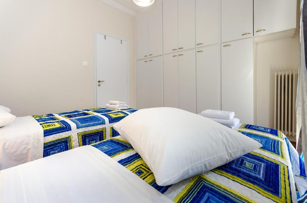 Postel nebo postele na pokoji v ubytování Pisces - City Center Apartment