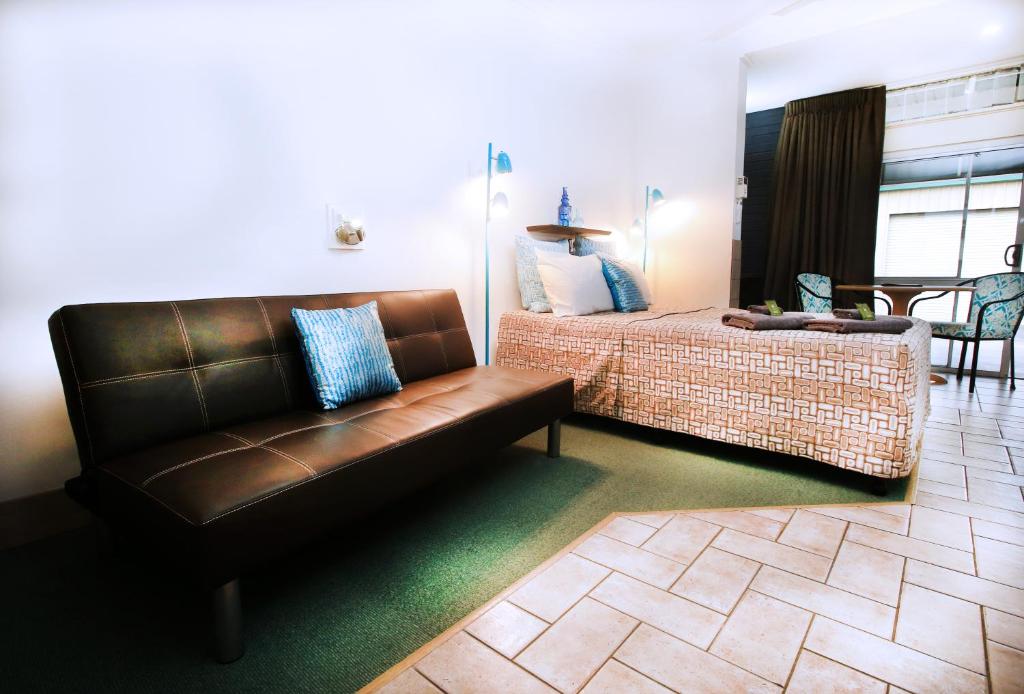 Postel nebo postele na pokoji v ubytování Central Motel Gin Gin