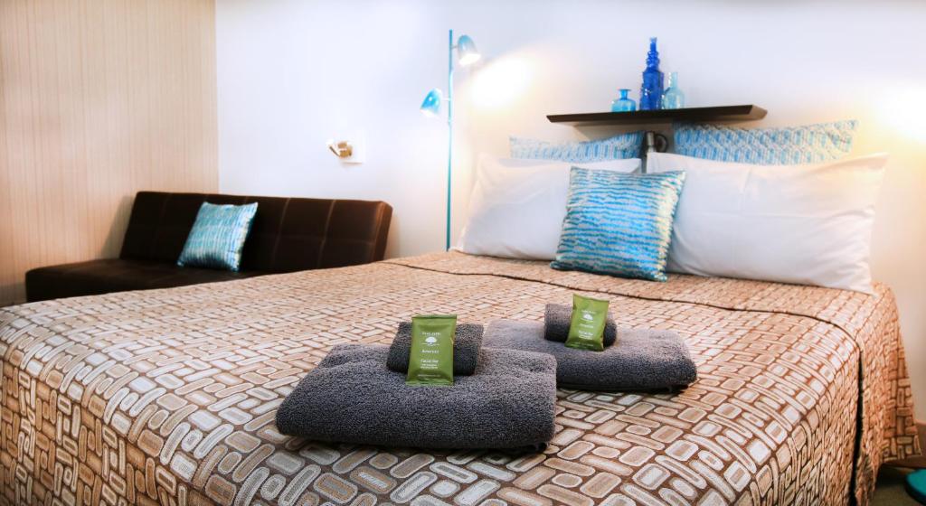 Postel nebo postele na pokoji v ubytování Central Motel Gin Gin