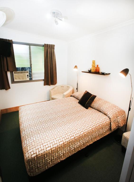 Postel nebo postele na pokoji v ubytování Central Motel Gin Gin