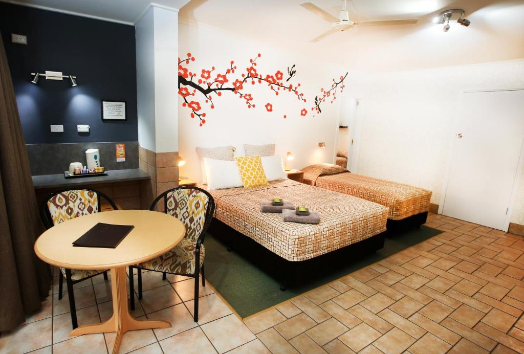 Postel nebo postele na pokoji v ubytování Central Motel Gin Gin