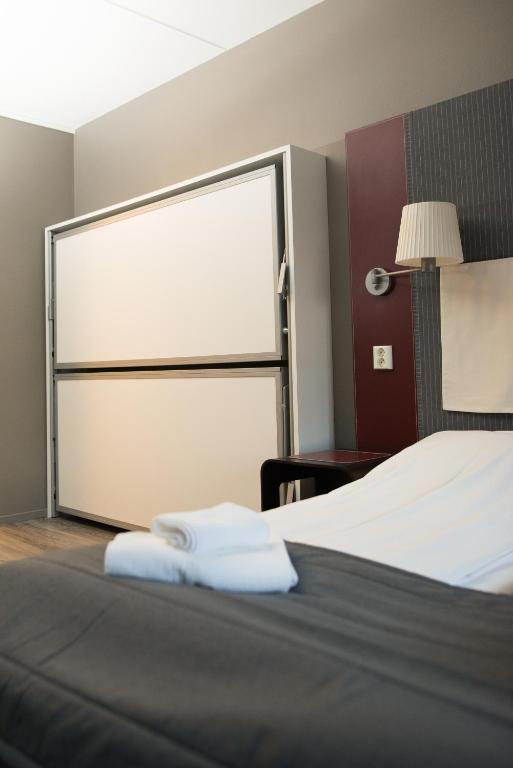 Postel nebo postele na pokoji v ubytování Oppdal Gjestetun Hotell
