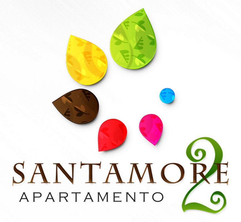 a logo for santanderarmaarmaarmaalorealorealorealorealorealore restaurant at Apartamento Santamore II in San Gil