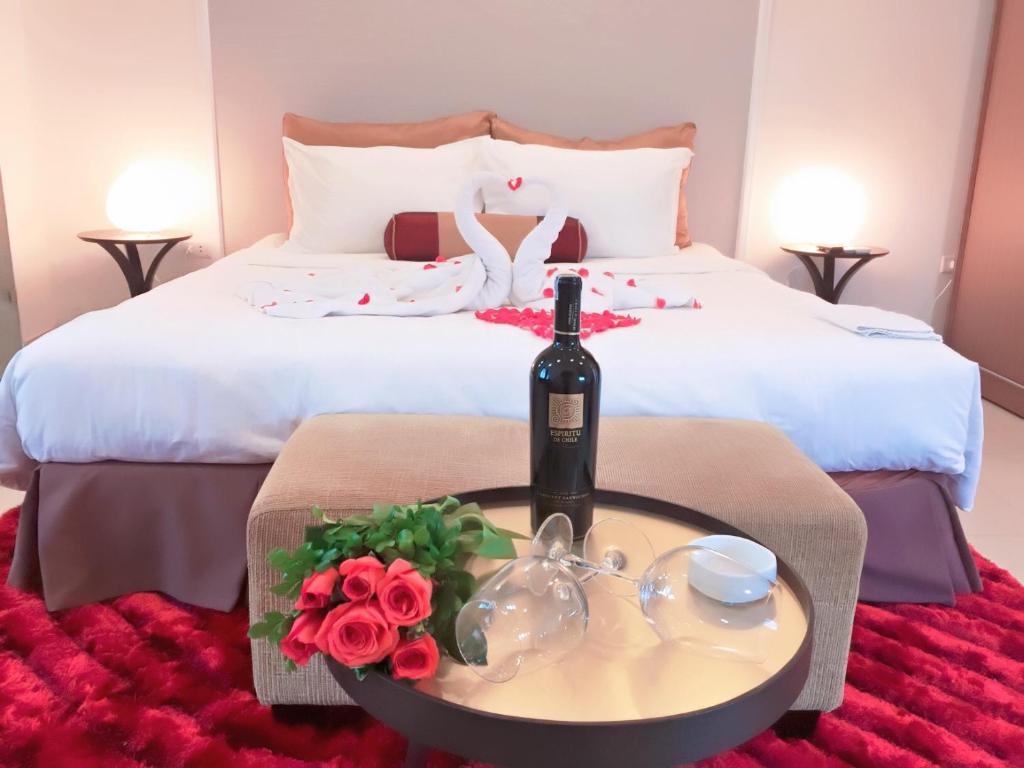 Postel nebo postele na pokoji v ubytování Smile Hotel
